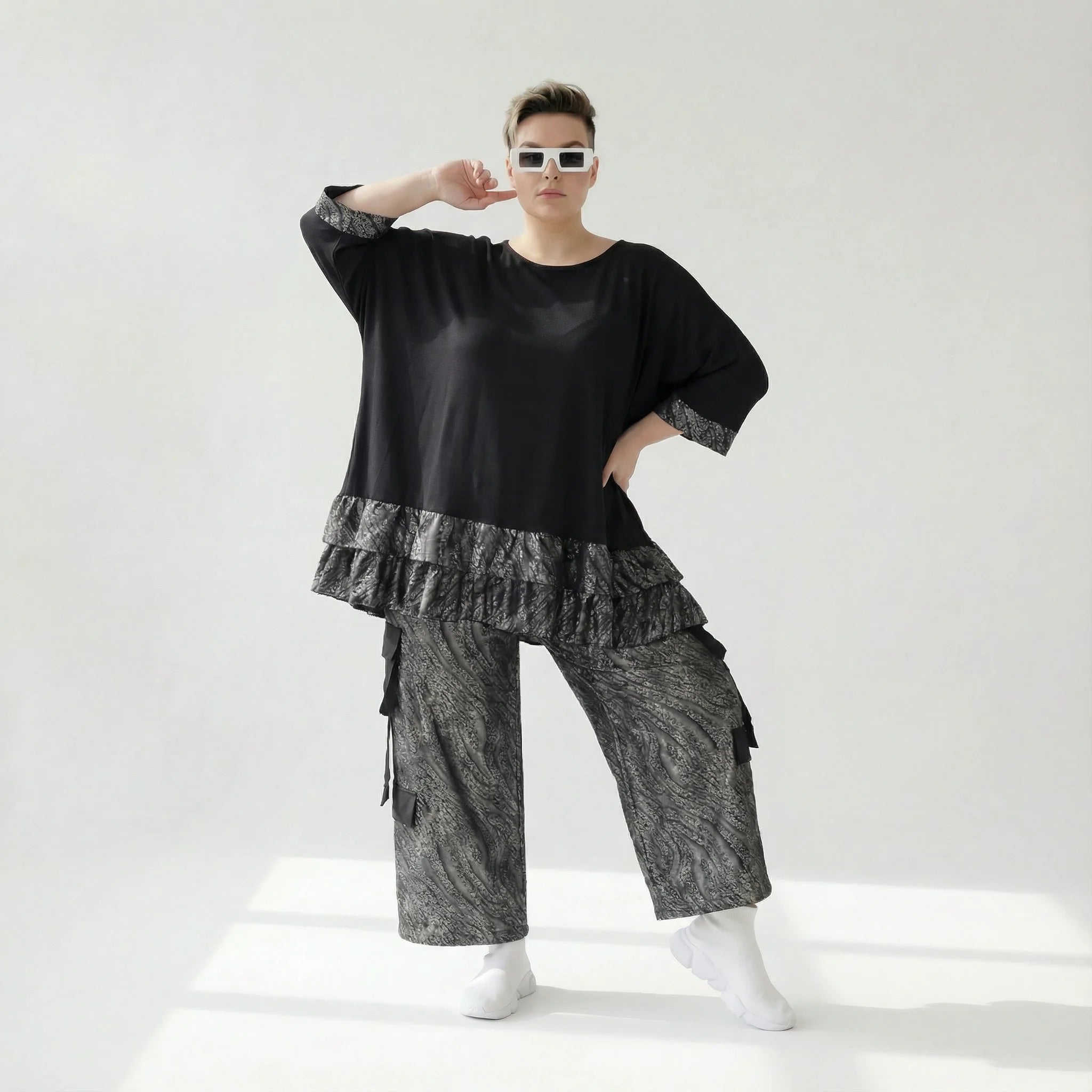 Ballon Hose mit Lederimitat und Fransen in Schwarz Grau aus Milano-Jersey im Avantgarde Look